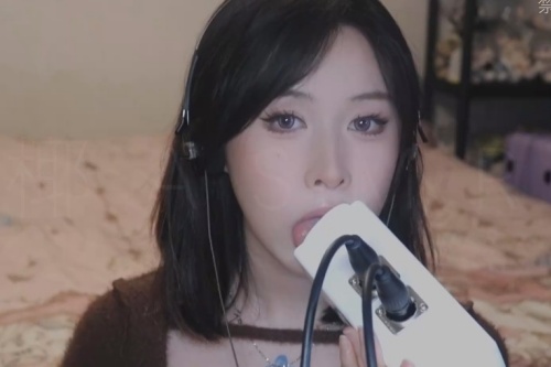 在音乐的节奏里,演唱亚运开幕式的阴影
